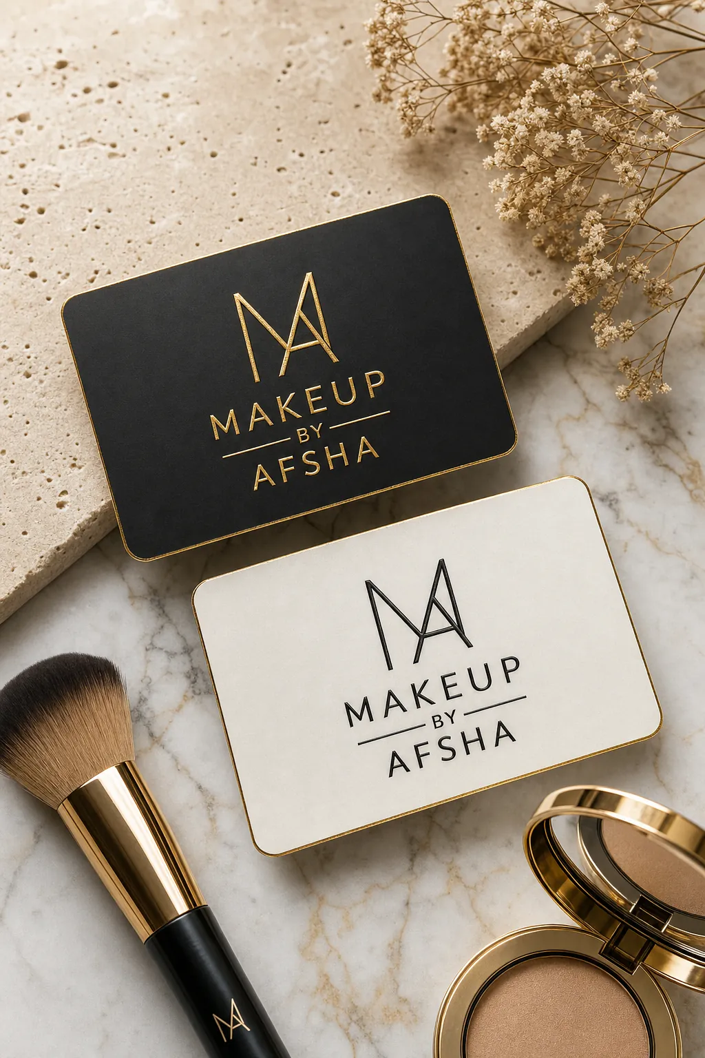 Luxury business card flatlay with brush and compact